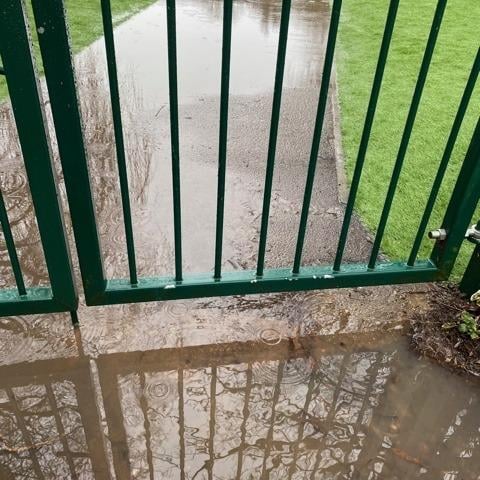 A group of residents are involved in a row with a Worthing primary school after instances of heavy flooding, which they say is destroying their gardens.