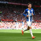 Pascal Gross of Brighton & Hove Albion celebrates after scoring their team's second goal during the Premier League match between Manchester United and Brighton & Hove Albion (Photo by Michael Regan/Getty Images)