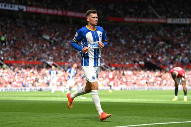 Pascal Gross of Brighton & Hove Albion celebrates after scoring their team's second goal during the Premier League match between Manchester United and Brighton & Hove Albion (Photo by Michael Regan/Getty Images)