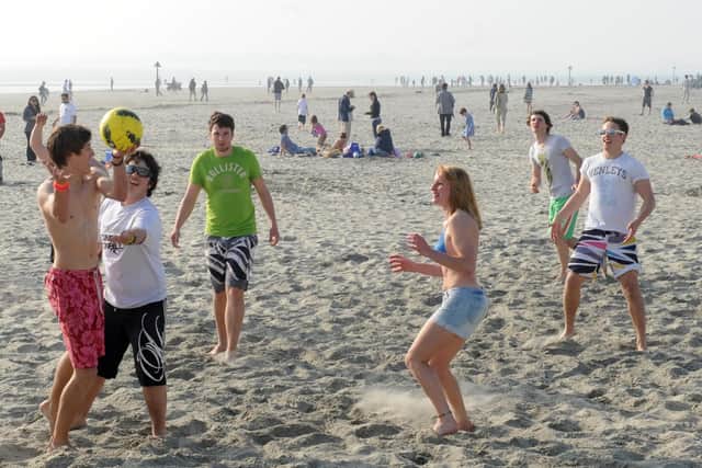 Beach games for Chichester University students during the hot weather of March 2012. Picture: Louise Adams