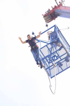 Veterinary surgeon Mariana Redpath, who has acrophobia – the extreme fear of heights – was cheered on by her son, Alex, and his classmates at Chesswood Junior School as she faced ‘one of my ultimate fears’ and bungee jumped at Brighton Marina