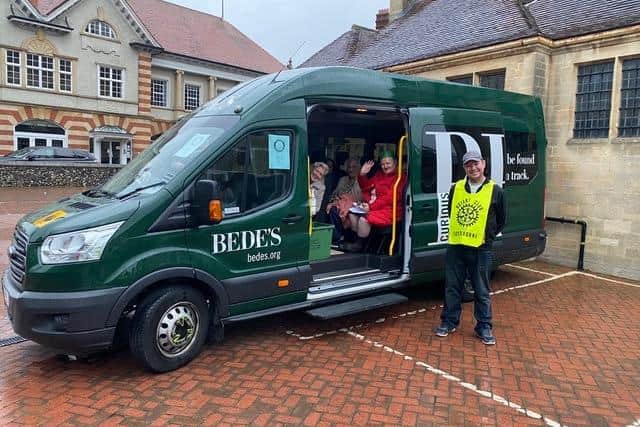 All aboard for a festive treat – one of the minibuses kindly loaned for the day by Bede’s School.