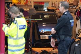 Police have issued a witness appeal after a car collided with a charity shop in Chichester today (Tuesday, September 19). Photo: Eddie Mitchell