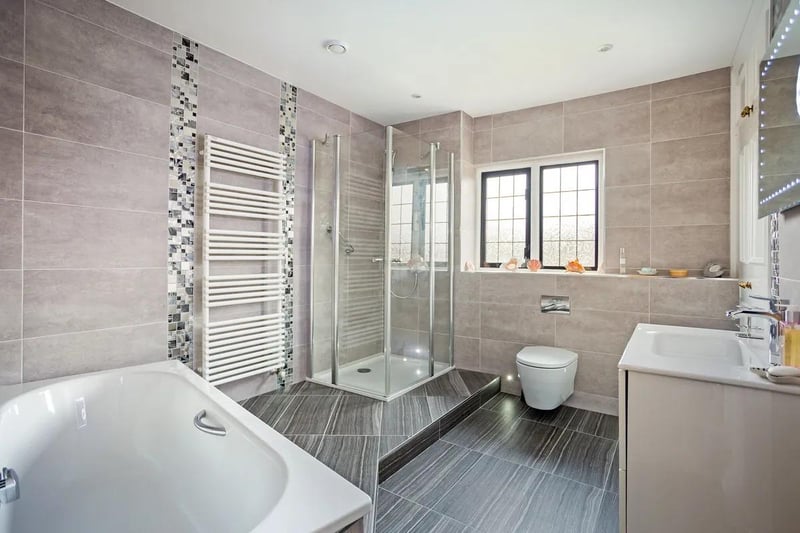 The modern decor gives the bathroom a fresh, clean sophisticated look.