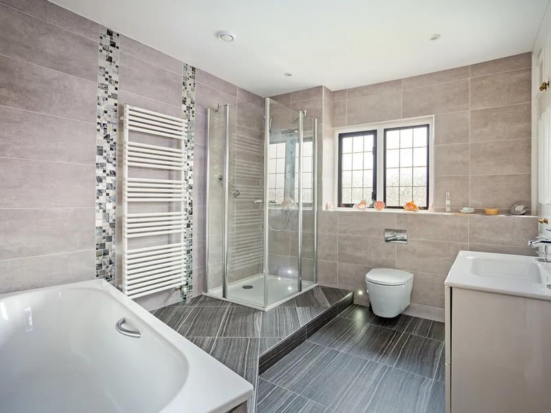 The modern decor gives the bathroom a fresh, clean sophisticated look.