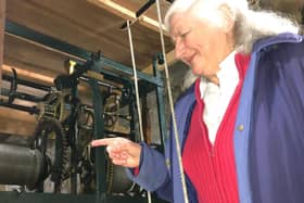 Tour leader Eleanor Austin points out all the 354-year-old cogs of St Thomas’ clock.