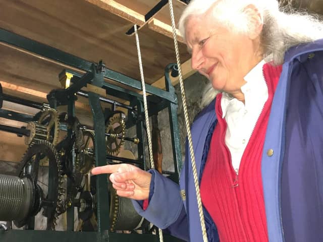Tour leader Eleanor Austin points out all the 354-year-old cogs of St Thomas’ clock.