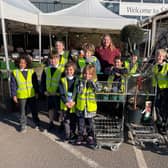 Ditchling School children collect their donation from South Downs Nurseries