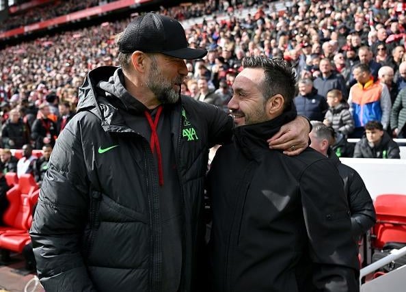 Jurgen Klopp manager of Liverpool with Roberto De Zerbi manager of Brighton and Hove Albion before the Premier League match at Anfield