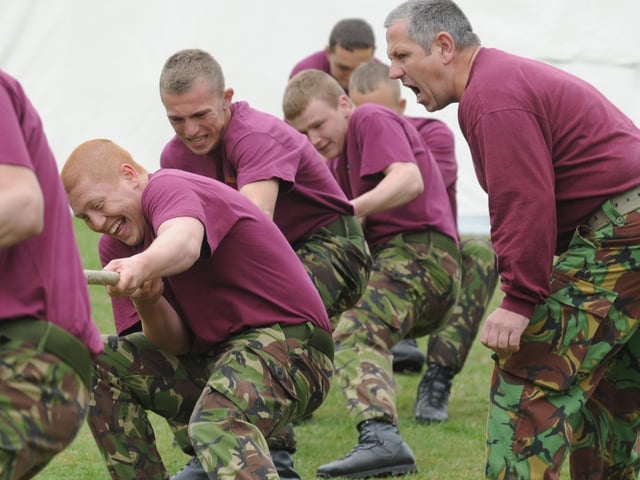 'Put your back into it'... the Royal Artillery team facing defeat at tug-of-war