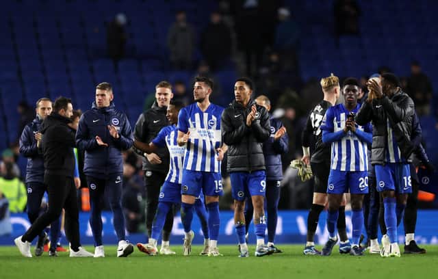 Players of Brighton & Hove Albion applaud their fans after defeating Tottenham Hotspur during the Premier League match between Brighton & Hove Albion and Tottenham Hotspur at American Express Community Stadium.(Photo by Julian Finney/Getty Images)