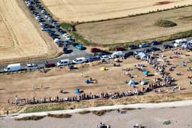 Hundreds of people are already gathered on Goring Gap to watch the near-total solar eclipse this evening. Picture: Eddie Mitchell