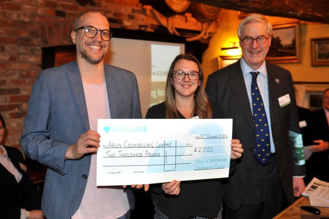 Judge Bex Bastable and family director Mark Woodhouse present a cheque for £2,000 to Arun Counselling Centre
