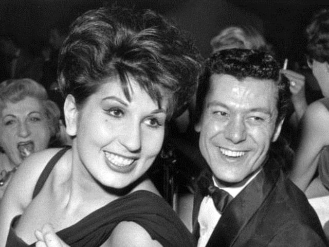 The 1950s recording artist Alma Cogan lived with her parents above their shop in Warwick Street, Worthing, then moved to a large house on the corner of Lansdowne Road and Downview Road in West Worthing. She is pictured here with Lionel Blair, who unveiled a blue plaque in her memory in 2017. One of the biggest stars of the pre-rock era, she sadly died of ovarian cancer aged 34 in October 1966.