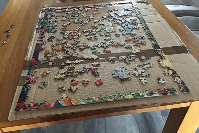 Volunteers are need to put puzzles together