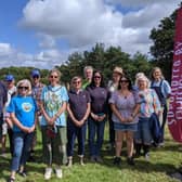 Burgess Hill town mayor Janice Henwood at the orchard opening with representatives from Lost Woods team, Burgess Hill District Rotary, Central Sussex Rotary, Burgess Hill Swift Supporters, Girlguiding and Burgess Hill Creative Community.