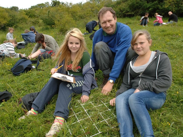Catherine Grayson and Abbie Hope with Nigel Flynn from the Sussex Wildlife Trust in July 2011