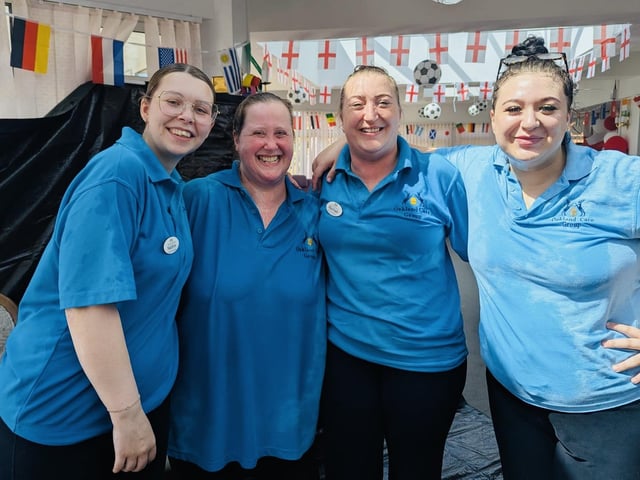 Staff still smiling despite the temperature, thanks to their games