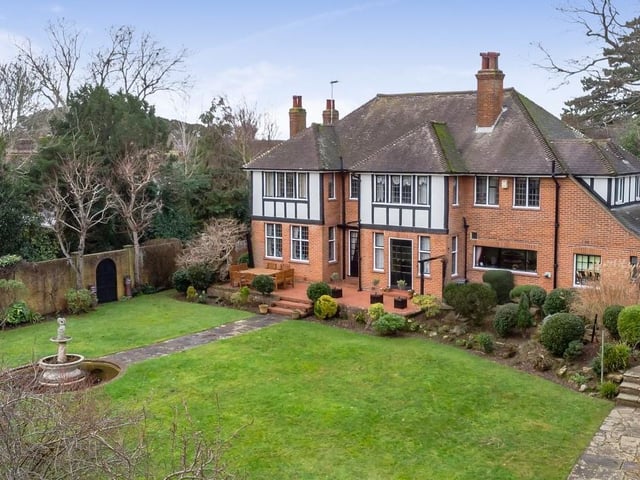 This substantial, detached 1920s home has five bedrooms, four bathrooms and four reception rooms. Outside there are two brick built outbuildings an external WC, a wooden shed and summer house. It is on the market for £1,350,000.