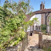 This Grade II listed cottage is tucked away in a village setting in Worthing
