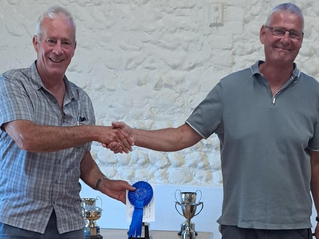 Simon Smith, left, won four trophies, including the British Fuchsia Society Blue Rosette for best fuchsia