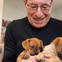 Peter and pups (contributed pic)