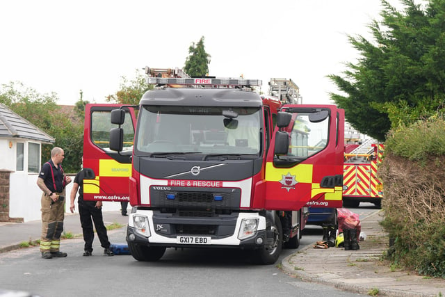 The fire service in Ivor Road, Woodingdean, Brighton