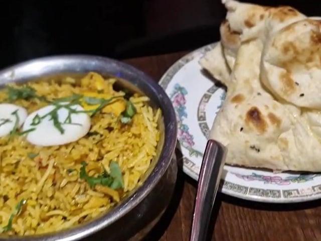 Chicken biryani and naan bread
