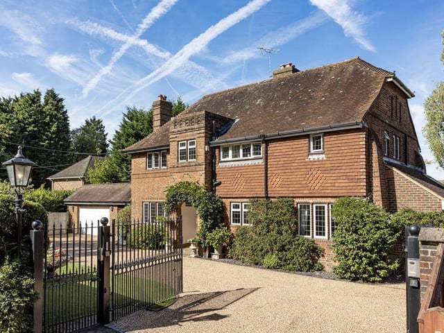 Four-bedroom detached family home believed to have been built in 1936 with part tile and brick elevations under a pitched tiled roof situated in a delightful semi-rural location of Ifield.
