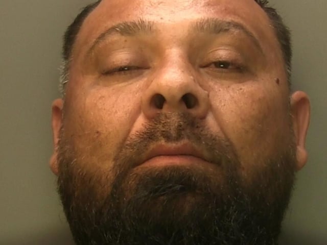 An offender used a false identity to enter the UK after previously being jailed and deported for similar offences. Ion Rudacan, also known as Ion Paun, was convicted as part of Operation Elba, an operation by Greater Manchester Police to the trafficking of women for sex work in the north west. Despite being jailed and deported, the 36-year-old made repeated efforts to re-enter the UK. He managed to enter the UK illegally under a false name, and documents showed he had hired a car in Brighton in July. But he was arrested by officers from Sussex Police’s Tactical Firearms Unit who carried out a proactive check on his vehicle while on patrol in Marine Parade, Brighton, on September 4. Rudacan was charged with multiple offences, and was remanded in custody. At Lewes Crown Court on October 10, he admitted three counts of breaching a Slavery and Trafficking Prevention Order, breaching a Deportation Order, three further attempted breaches of the Deportation Order, and seeking and obtaining leave to enter or remain in the UK via deceptive means. Rudacan, of no fixed address, was sentenced to six years in prison. The court was told how Rudacan, a Romanian national, was convicted as part of Operation Elba for controlling prostitution for gain and for human trafficking offences in the Manchester area. He was sentenced to two years and three months in prison in November 2021, along with a Deportation Order. Rudacan was deported on January 27, 2022. He was also made the subject of a Slavery and Trafficking Prevention Order for ten years, which restricts his ability to own, lease or possess a vehicle in the UK without informing the police, and restricts his access to using devices such as a mobile phone. It was revealed how he had attempted to enter the UK under a false EU Settlement application. He was removed from the UK at Stansted Airport on October 5, 2022 and June 26 this year, and was removed from Liverpool John Lennon Airport on October 14, 2022. Officers stopped him in a vehicle in Marine Parade, Brighton,