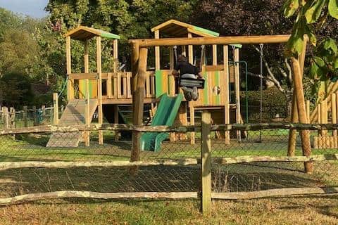 Some residents near a children's playground in Mannings Heath, near Horsham, want the roof removed from newly-installed play equipment because they say it is spoiling the view from their homes