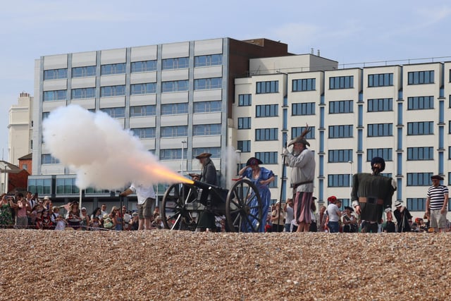 Hastings Pirate Day 2022. Cannon fire on the beach next to Pelham Place. Photo by Kevin boorman.