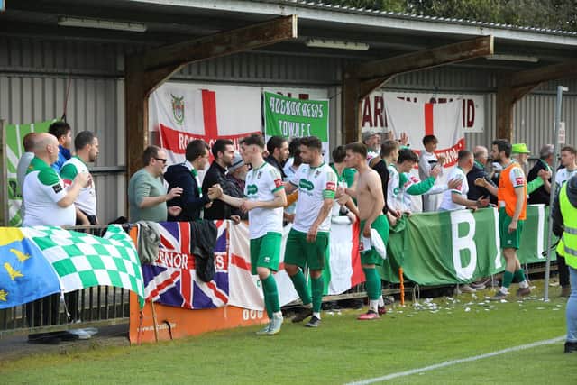 The Rocks' players and fans at the end of their loss at Hastings United at the weekend | Picture: Martin Denyer