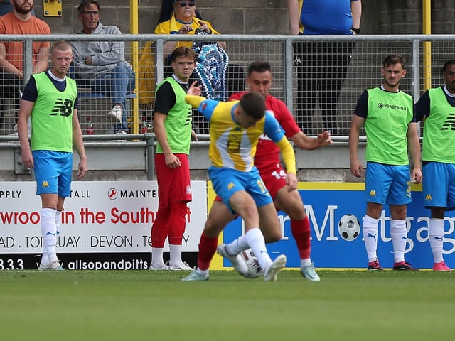 Action from Worthing's 3-0 win at Torquay United which put them top of National League South