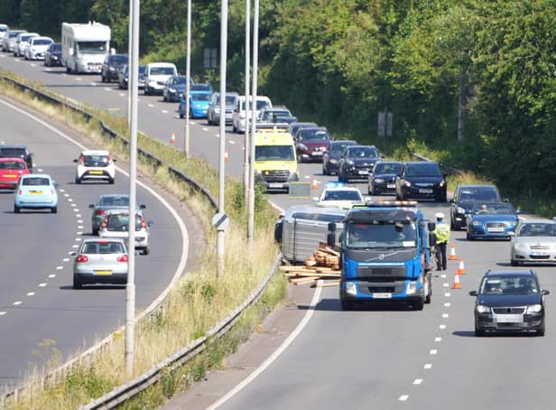 A grey vehicle was photographed on its side on the A27 near Patcham on Saturday, July 9
