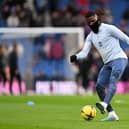 Moises Caicedo of Brighton & Hove Albion warms up prior to the Premier League match against AFC Bournemouth