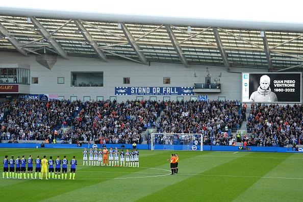 Brighton & Hove Albion and Tottenham Hotspur players take part in a minutes applause in memory of former Tottenham Hotspur fitness coach Gian Piero Ventrone prior to the Premier League match