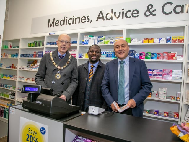 MP Andrew Griffith, mayor Tony Hunt and pharmacist Martin Chisanga at the opening