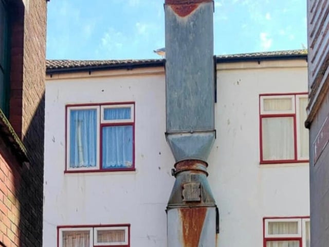 How the rear of the building looked before the mural