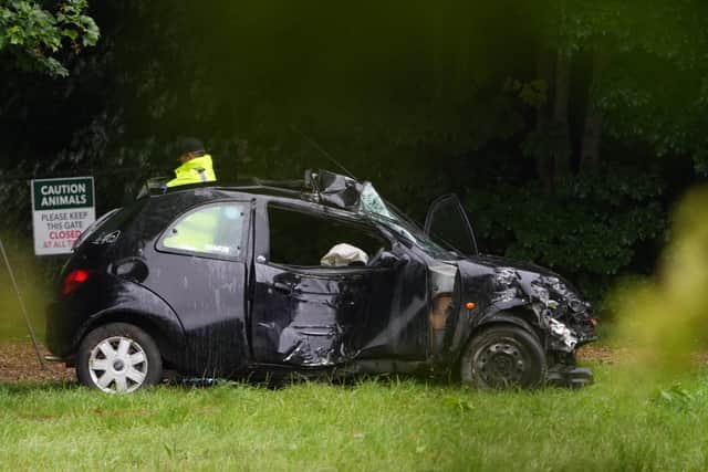 Pictures from the one-vehicle crash on the A24 northbound. Pictures by Eddie Mitchell