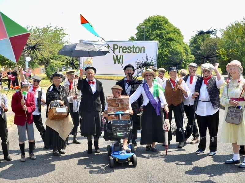 The floats and walking groups proceeded through the village in colourful and imaginative costumes with crowds of spectators lining the streets to cheer them on