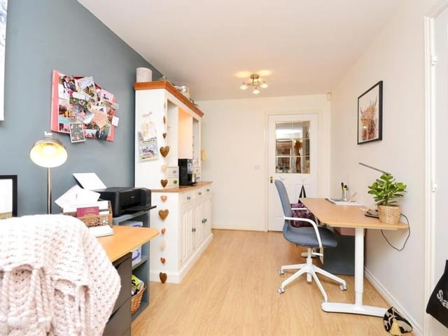 The third main room on the ground floor of the Millrise Road property can be used for a variety of things. Maybe as an office or study?