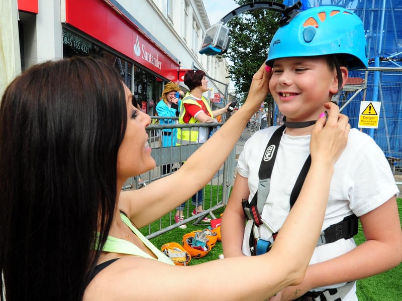Pamela Burgess prepares ten-year-old Leon Weller-Norfolk for his flight