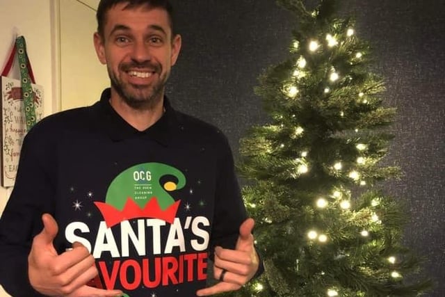 Janine McGinn sent in this picture of her husband wearing his Christmas jumper reading 'Santa's Favourite Oven Cleaner'