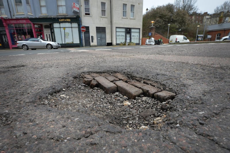 A pothole in St Leonards: Junction of St Johns Road, Western Road and Kings Road.