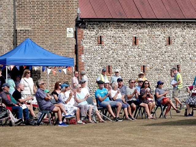 Visitors enjoying the music from Lancing Brass Band