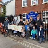 Protestors gathered outside Southover Primary School with a banner demanding the long promised School Street in Potters Lane.