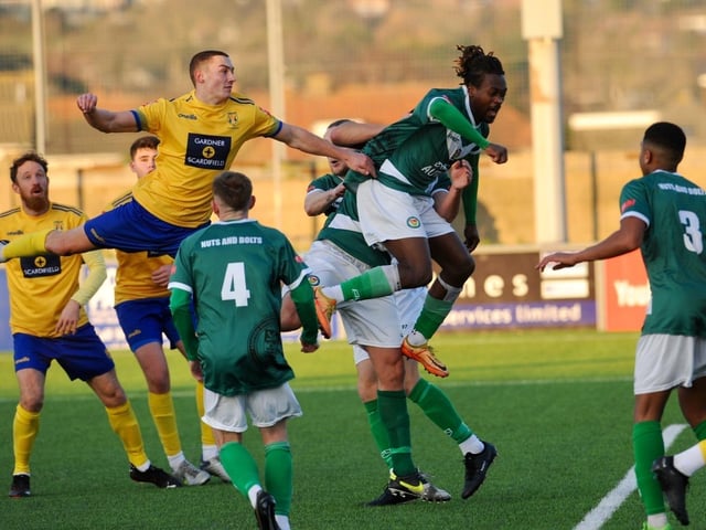 Action from Lancing's 3-2 win over Ashford United on Saturday. Picture by Stephen Goodger