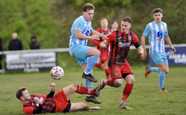 Action from Worthing United's 2-2 draw with Wick in the SCFL Division 1