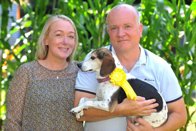 Paula and Pete Closier with Bonnie who got lost in Bolney and returned home with a rosette from a dog show. Picture: Steve Robards, SR2207193